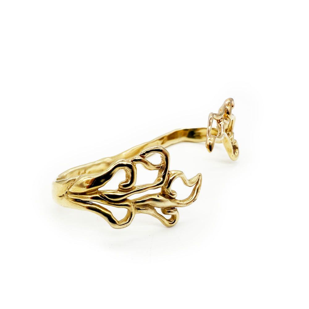 
                  
                    Kumai Brass Hand Cuff
                  
                